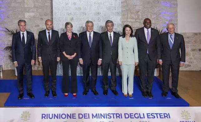 From left, U.S. Secretary of State Antony Blinken , French Foreign Minister Jean-Noël Barrot, Canada's Foreign Minister Melanie Joly, Italian Foreign Minister Antonio Tajani, Japanese Foreign Minister Takeshi Iwaya, German Foreign Minister Annalena Baerbock, Britain's Foreign Secretary David Lammy, and European Union foreign policy chief Josep Borrell pose for a family photo at the G7 of foreign Ministers in Anagni, some 70 kilometers south-east of Rome, Monday, Nov. 25, 2024. (AP Photo/Alessandra Tarantino)