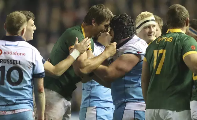 South Africa's Eben Etzebeth, left, and Scotland's Zander Fagerson have an tussle during the Autumn Nations series rugby union match between Scotland and South Africa in Edinburgh, Scotland, Sunday, Nov. 10, 2024. (AP Photo/Scott Heppell)