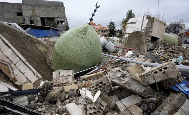 A destroyed mosque in the town of Bint Jbeil, southern Lebanon, following a ceasefire between Israel and Hezbollah that went into effect on Wednesday, Nov. 27, 2024. (AP Photo/Hussein Malla)