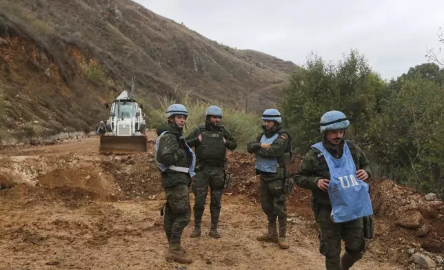 UNIFIL peacekeepers secure the area in Khardali, southern Lebanon, following a ceasefire between Israel and Hezbollah on Wednesday, Nov. 27, 2024. (AP Photo/Mohammed Zaatari)