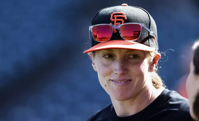 FILE - San Francisco Giants assistant baseball coach Alyssa Nakken speaks to a reporter in San Francisco, July 7, 2023. (AP Photo/Josie Lepe, File)