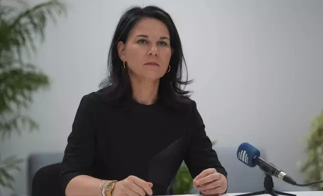 Germany Foreign Minister Annalena Baerbock attends a news conference at the COP29 U.N. Climate Summit, Saturday, Nov. 23, 2024, in Baku, Azerbaijan. (AP Photo/Peter Dejong)
