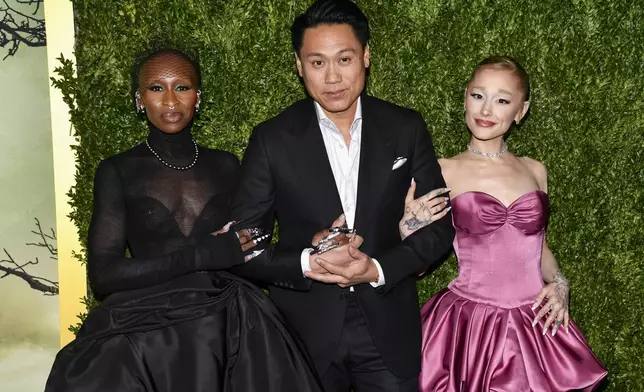 Cynthia Erivo, from left, Jon M. Chu, and Ariana Grande attend the premiere of "Wicked" at the Museum of Modern Art on Thursday, Nov. 14, 2024, in New York. (Photo by Evan Agostini/Invision/AP)