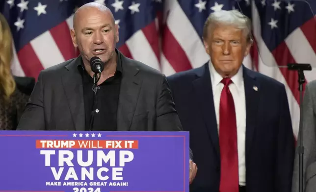 CEO of UFC Dana White speaks as speaksRepublican presidential nominee former President Donald Trump looks on at an election night watch party, Wednesday, Nov. 6, 2024, in West Palm Beach, Fla. (AP Photo/Alex Brandon)