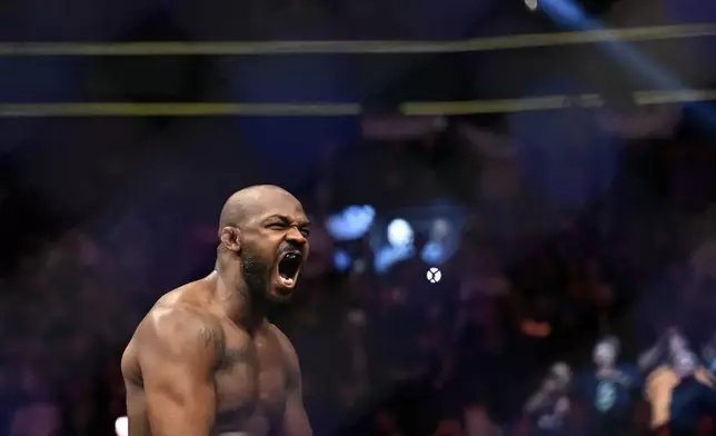 FILE - Jon Jones reacts after his victory over Ciryl Gane in a UFC 285 mixed martial arts heavyweight title bout Saturday, March 4, 2023, in Las Vegas. (AP Photo/David Becker, File)