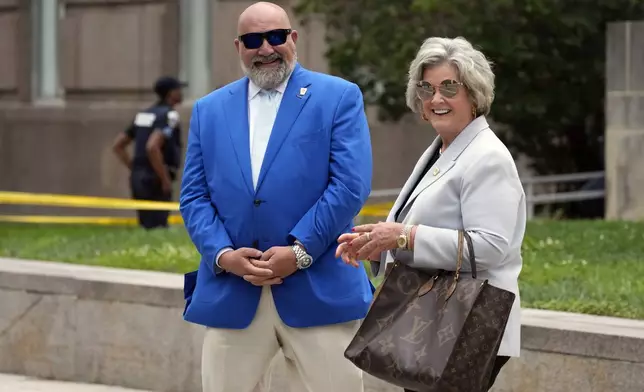 Senior strategist's for former President Donald Trump, Chris LaCivita and Susie Wiles stand outside after Trump arrived at the E. Barrett Prettyman U.S. Federal Courthouse, Aug. 3, 2023, in Washington, to face a judge on federal conspiracy charges alleging Trump conspired to subvert the 2020 election. (AP Photo/Alex Brandon, File)