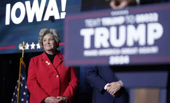 FILE - Susie Wiles watches as Republican presidential candidate former President Donald Trump speaks at a caucus night party in Des Moines, Iowa, Jan. 15, 2024. (AP Photo/Andrew Harnik, File)