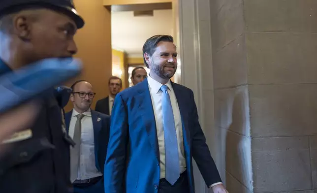 Vice President-elect JD Vance, still a Republican senator from Ohio, walks from a private meeting with President-elect Donald Trump's nominee to be attorney general, former Rep. Matt Gaetz, R-Fla., at the Capitol in Washington, Wednesday, Nov. 20, 2024. (AP Photo/J. Scott Applewhite)