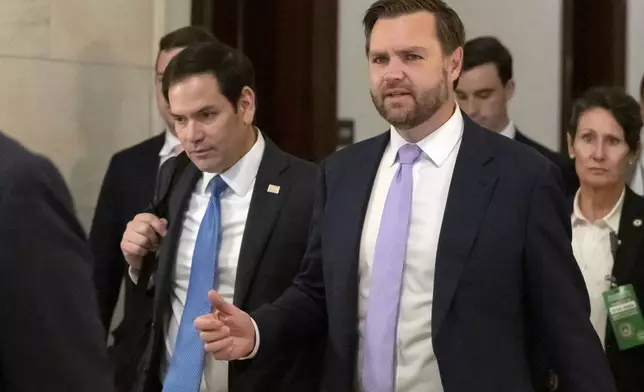 Sen. Marco Rubio, R-Fla., left, and Vice President-elect Sen. JD Vance, R-Ohio, walk together after leaving Vance's office on Capitol Hill, Thursday, Nov. 21, 2024, in Washington. (AP Photo/Mark Schiefelbein)