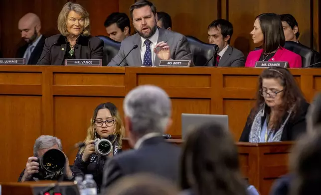 FILE - Sen. JD Vance, R-Ohio, center speaks during a Senate Banking Committee hearing on Capitol Hill in Washington, March 7, 2023. (AP Photo/Andrew Harnik, File)