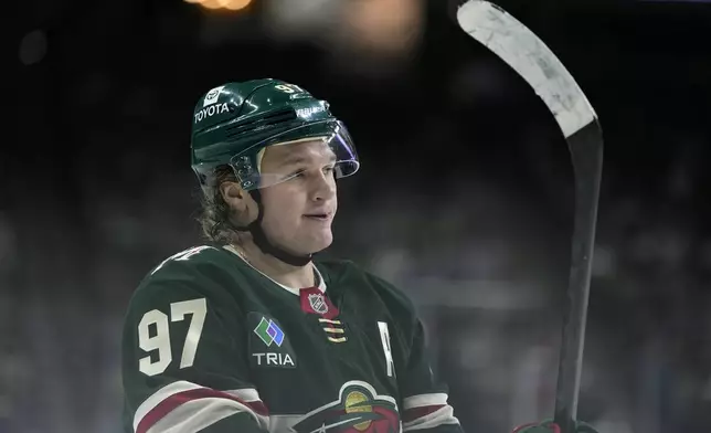 Minnesota Wild left wing Kirill Kaprizov reacts after missing a shot during the first period of an NHL hockey game against the Winnipeg Jets, Monday, Nov. 25, 2024, in St. Paul, Minn. (AP Photo/Abbie Parr)