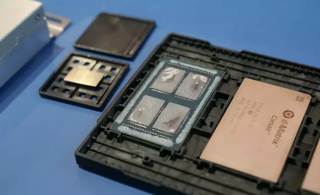 A display of d-Matrix Corsair chips and a package of 4 chips are shown in Santa Clara, Calif., Wednesday, Oct. 16, 2024. (AP Photo/Jeff Chiu)