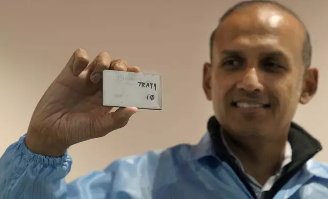 Sid Sheth, CEO and Co-founder of d-Matrix, holds up a d-Matrix Corsair chip during an interview in Santa Clara, Calif., Wednesday, Oct. 16, 2024. (AP Photo/Jeff Chiu)