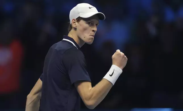 Italy's Jannik Sinner reacts during the final match of the ATP World Tour Finals against Taylor Fritz of the United States at the Inalpi Arena, in Turin, Italy, Sunday, Nov. 17, 2024. (AP Photo/Antonio Calanni)