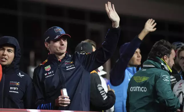 Red Bull driver Max Verstappen, of the Netherlands, waves before the F1 Las Vegas Grand Prix auto race, Saturday, Nov. 23, 2024, in Las Vegas. (AP Photo/John Locher)