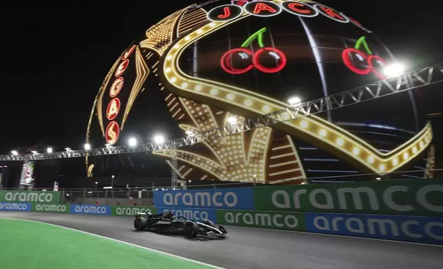 Mercedes driver George Russell, of Britain, drives during qualifications for the Formula One U.S. Grand Prix auto race, Friday, Nov. 22, 2024, in Las Vegas. (AP Photo/Rick Scuteri)