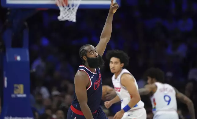 Los Angeles Clippers' James Harden reacts after scoring during the first half of an NBA basketball game against the Philadelphia 76ers, Sunday, Nov. 24, 2024, in Philadelphia. (AP Photo/Matt Slocum)