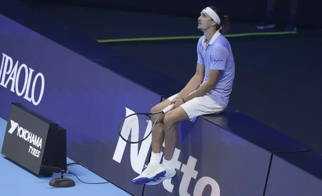 Germany's Alexander Zverev watches a video review during the semifinal tennis match against Taylor Fritz of the United States at the ATP World Tour Finals at the Inalpi Arena in Turin, Italy, Saturday, Nov. 16, 2024. (AP Photo/Antonio Calanni)