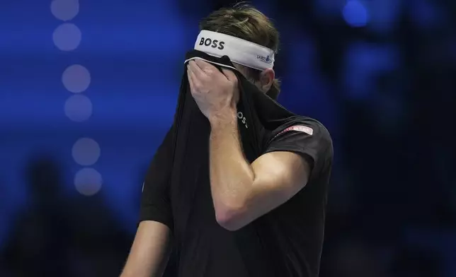 Taylor Fritz of the United States reacts during a semifinal tennis match against Germany's Alexander Zverev at the ATP World Tour Finals at the Inalpi Arena in Turin, Italy, Saturday, Nov. 16, 2024. (AP Photo/Antonio Calanni)