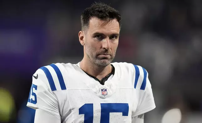 Indianapolis Colts quarterback Joe Flacco walks off the field after an NFL football game against the Minnesota Vikings, Sunday, Nov. 3, 2024, in Minneapolis. The Vikings won 21-13. (AP Photo/Abbie Parr)