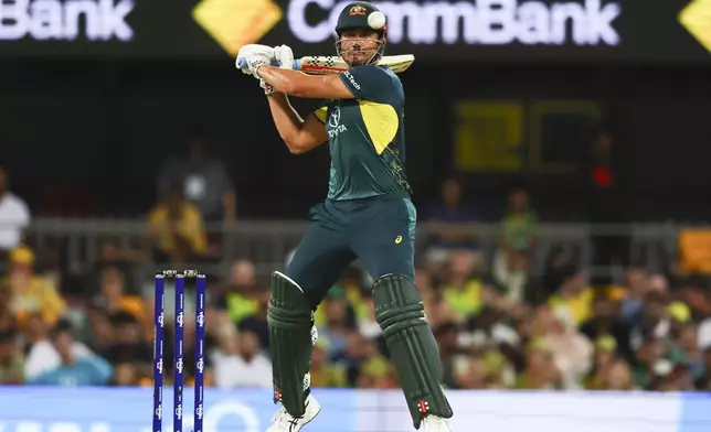 Australia's Marcus Stoinis bats during the T20 cricket international between Pakistan and Australia at the Gabba in Brisbane, Australia, Thursday, Nov. 14, 2024. (AP Photo/Tertius Pickard)