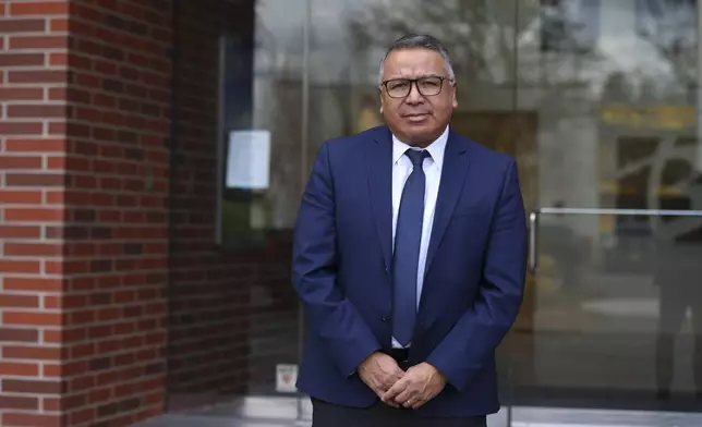 Gustavo Balderas, superintendent of Beaverton School District, stands for a photo outside of the Beaverton school district administrative office in Beaverton, Ore., Monday, Nov. 25, 2024. (AP Photo/Amanda Loman)