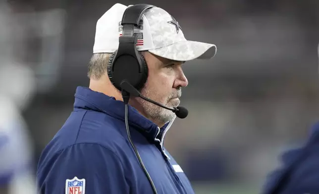 Dallas Cowboys head coach Mike McCarthy watches play against the Philadelphia Eagles in the second half of an NFL football game in Arlington, Texas, Sunday, Nov. 10, 2024. (AP Photo/Jeffrey McWhorter)