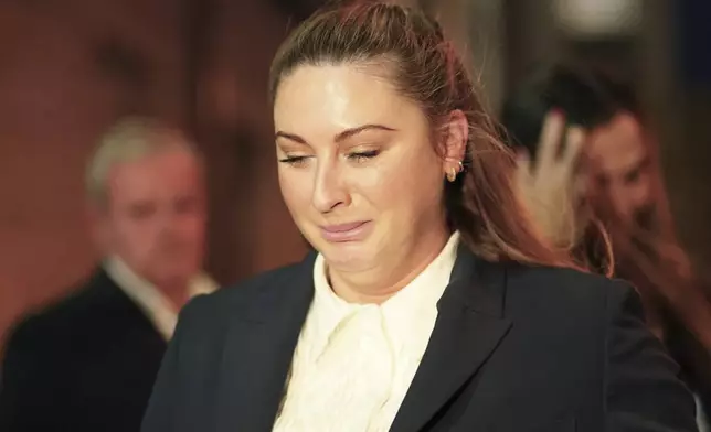 Nikita Hand, who is also known as Nikita Ni Laimhin, leaves the High Court in Dublin, Ireland, Friday, Nov. 22, 2024, after a civil jury found that mixed martial arts fighter Conor McGregor sexually assaulted her in a hotel penthouse after a night of heavy partying. (Brian Lawless/PA via AP)