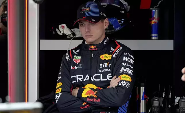 Red Bull driver Max Verstappen, of the Netherland, waits in the garage area during a practice session for the Formula One U.S. Grand Prix auto race, Thursday, Nov. 21, 2024, in Las Vegas. (AP Photo/Rick Scuteri)