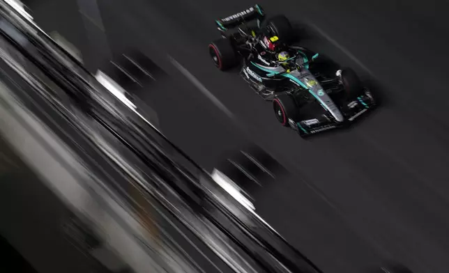 Mercedes driver Lewis Hamilton, of Britain, drives during a practice session for the Formula One U.S. Grand Prix auto race, Thursday, Nov. 21, 2024, in Las Vegas. (AP Photo/John Locher)