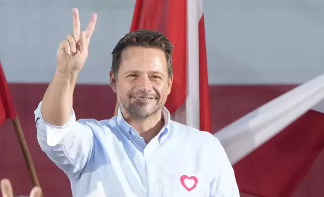 ALTERNATIVE CROP FILE - Poland's Civic Platform member, Warsaw Mayor Rafal Trzaskowski, gestures during an election campaign rally in Otwock, Poland, on Sept. 25, 2023. (AP Photo/Czarek Sokolowski, File)