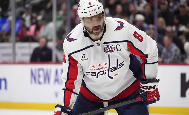 Washington Capitals left wing Alex Ovechkin waits for a face off in the second period of an NHL hockey game against the Colorado Avalanche, Friday, Nov. 15, 2024, in Denver. (AP Photo/David Zalubowski)