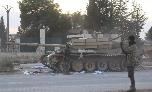 Opposition forces take control of areas outside Aleppo, Syria, Friday, Nov. 29, 2024. (AP Photo/Ghaith Alsayed)