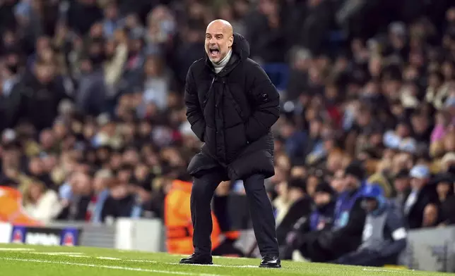 Manchester City manager Pep Guardiola reacts during the Champions League opening phase soccer match between Manchester City and Feyenoord at the Etihad Stadium in Manchester, England, Tuesday, Nov. 26, 2024. (Martin Rickett/PA via AP)