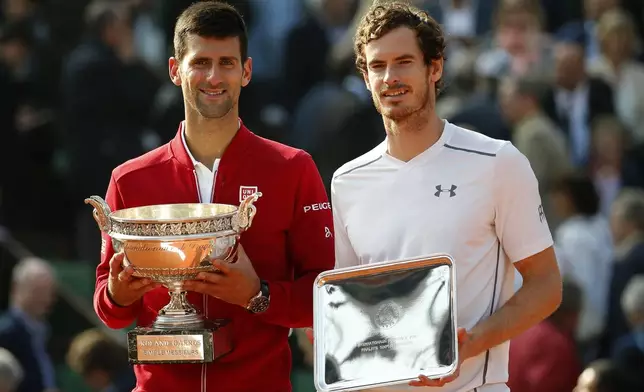 FILE - Serbia's Novak Djokovic, left, and Britain's Andy Murray holds their trophy after their final match of the French Open tennis tournament at the Roland Garros stadium, Sunday, June 5, 2016 in Paris. (AP Photo/Alastair Grant, File)