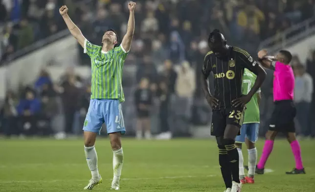 Seattle Sounders defender Nathan (4) reacts on the team's 2-1 win over Los Angeles FC in overtime in an MLS Western Conference semifinal soccer match in Los Angeles, Saturday, Nov. 23, 2024. (AP Photo/Kyusung Gong)