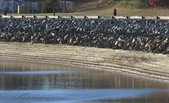 Water levels sit below normal at the Brick Reservoir in Brick N.J., on Tuesday, Nov. 12, 2024 amid record-breaking dry conditions in New Jersey. (AP Photo/Wayne Parry)