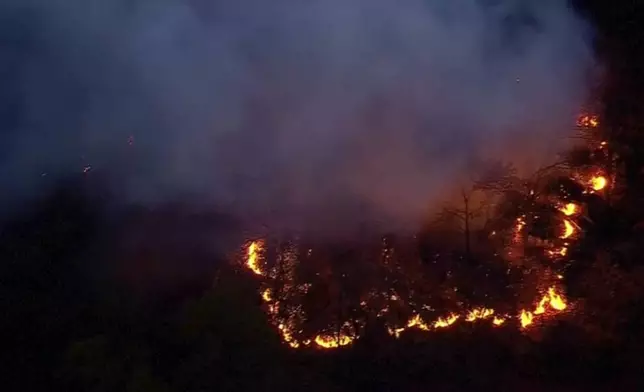 This aerial image taken from video shows a brush fire that broke out in a park on the northern tip of Manhattan in Inwood, N.Y., Wednesday, Nov. 13, 2024. (WABC-TV via AP)