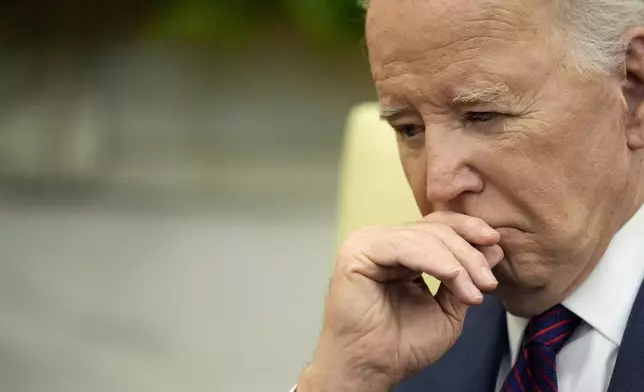 President Joe Biden listens during a meeting with Iraq's Prime Minister Shia al-Sudani in the Oval Office of the White House, Monday, April 15, 2024, in Washington. (AP Photo/Alex Brandon)