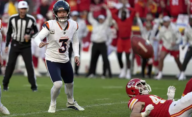 Denver Broncos kicker Wil Lutz (3) chases after the ball after his last-second field goal attempt was blocked during the second half of an NFL football game against the Kansas City Chiefs Sunday, Nov. 10, 2024, in Kansas City, Mo. The Chiefs won 16-14. (AP Photo/Charlie Riedel)