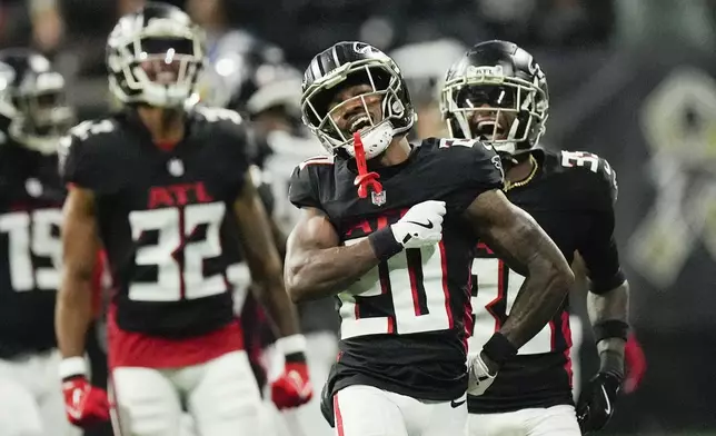 Atlanta Falcons cornerback Dee Alford (20) reacts after a defensive stop on fourth down during the second half of an NFL football game against the Dallas Cowboys, Sunday, Nov. 3, 2024, in Atlanta. (AP Photo/ John Bazemore)