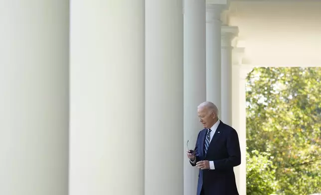 President Joe Biden walks to speak in the Rose Garden of the White House in Washington, Thursday, Nov. 7, 2024. (AP Photo/Mark Schiefelbein)