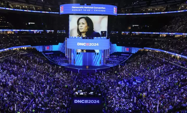 A video of Democratic presidential nominee Vice President Kamala Harris is seen during the Democratic National Convention Monday, Aug. 19, 2024, in Chicago. (AP Photo/J. Scott Applewhite)