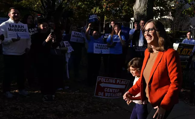 Sarah McBride, Democratic candidate for Delaware's at-large congressional district, greets supporters at the Immanuel Highlands Episcopal Church on Election Day, Tuesday, Nov. 5, 2024, in Wilmington, Del. (AP Photo/Pamela Smith)