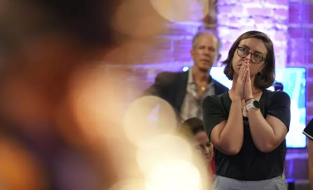 Dr. Chelsea Daniels, who works in family medicine for Planned Parenthood, reacts after the defeat of Amendment 4, which would have enshrined abortion rights in the state, at a Yes On 4 campaign watch party on Election Day, Tuesday, Nov. 5, 2024, in St. Petersburg, Fla. (AP Photo/Rebecca Blackwell)