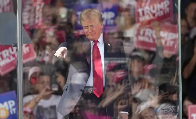 Republican presidential nominee former President Donald Trump arrives at a campaign rally in Gastonia, N.C., Saturday, Nov. 2, 2024. (AP Photo/Chris Carlson)