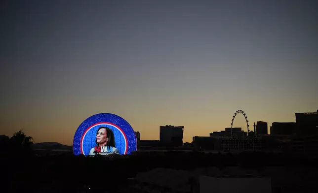 A political advertisement for Democratic presidential nominee Vice President Kamala Harris is displayed on the Sphere, Monday, Nov. 4, 2024, in Las Vegas. (AP Photo/John Locher)