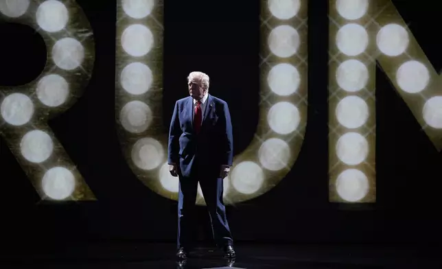 Republican presidential candidate former President Donald Trump is introduced during the final night of the Republican National Convention Thursday, July 18, 2024, in Milwaukee. (AP Photo/J. Scott Applewhite)