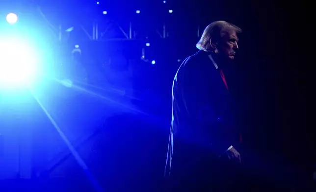 Supporters cheer on Republican presidential nominee former President Donald Trump leaves the stage after speaking at a campaign rally at Macomb Community College, Friday, Nov. 1, 2024, in Warren, Mich. (AP Photo/Julia Demaree Nikhinson)