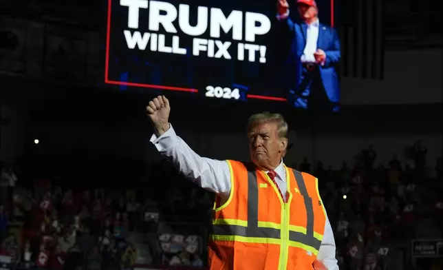 Republican presidential nominee former President Donald Trump gestures after speaking at a campaign rally at Resch Center, Wednesday, Oct. 30, 2024, in Green Bay, Wis. (AP Photo/Julia Demaree Nikhinson)